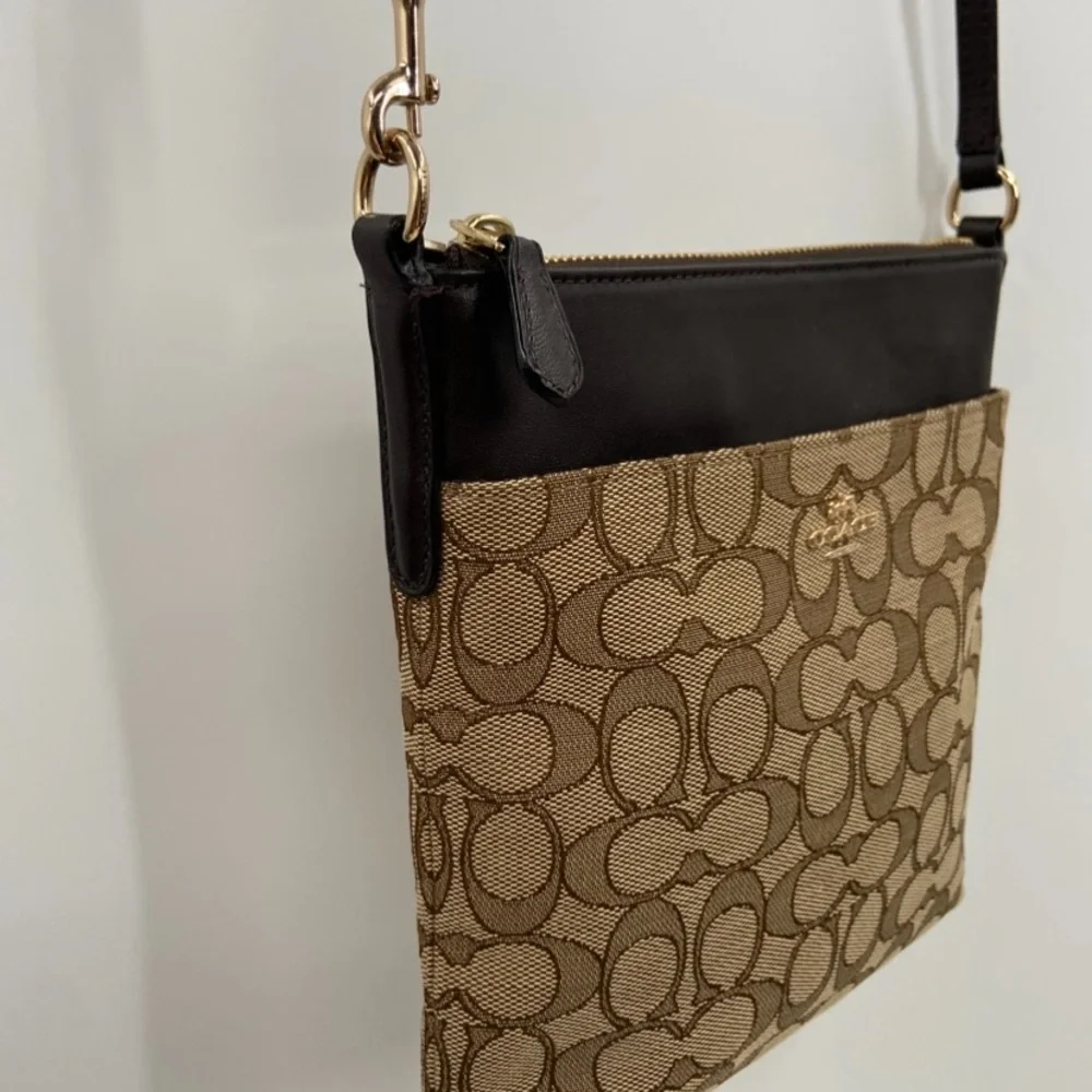 NEW Coach Bag Signature Canvas North South Swing pack 52576‎